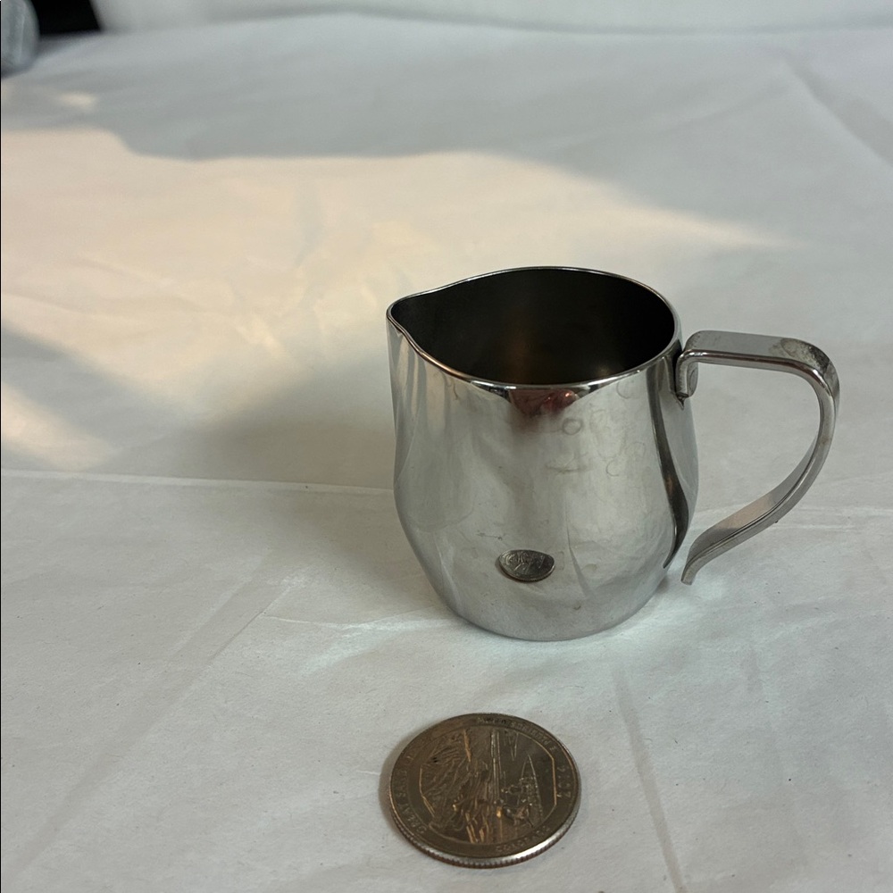 Set of Silver Metal Creamer Pitchers
